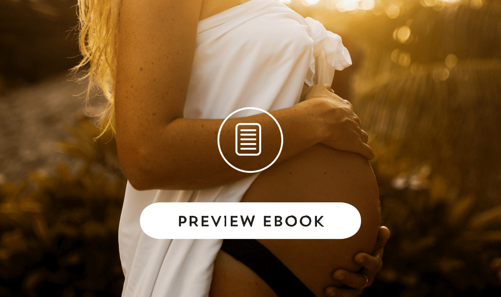 Woman holding pregnant belly with text 'preview ebook' over the top